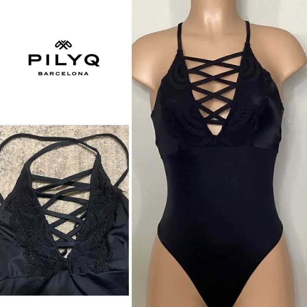 New. Pilyq LACE front with black lace trim swimsuit. Run small